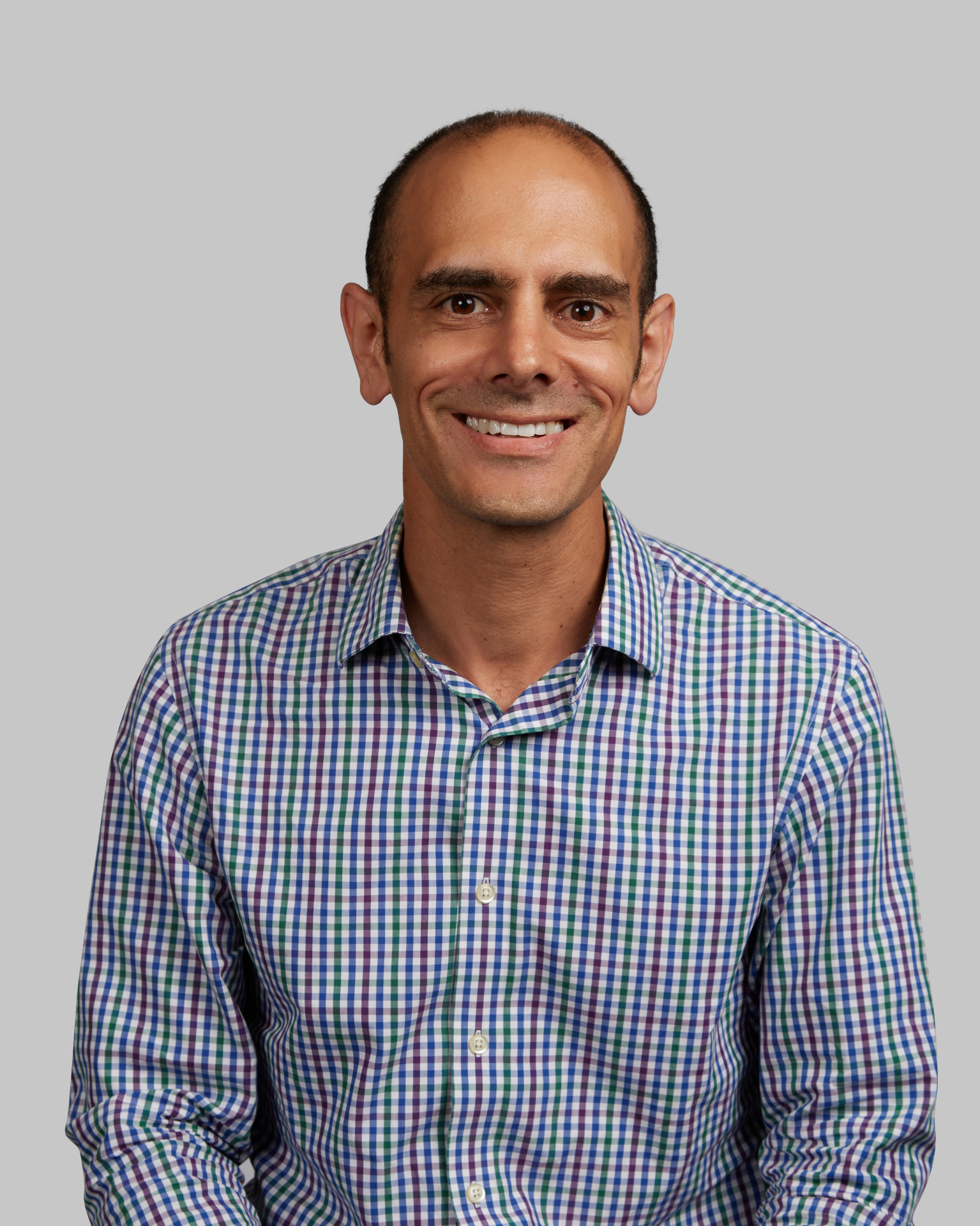 Dean Salakas presenting keynote on retail strategies - professional speaker headshot