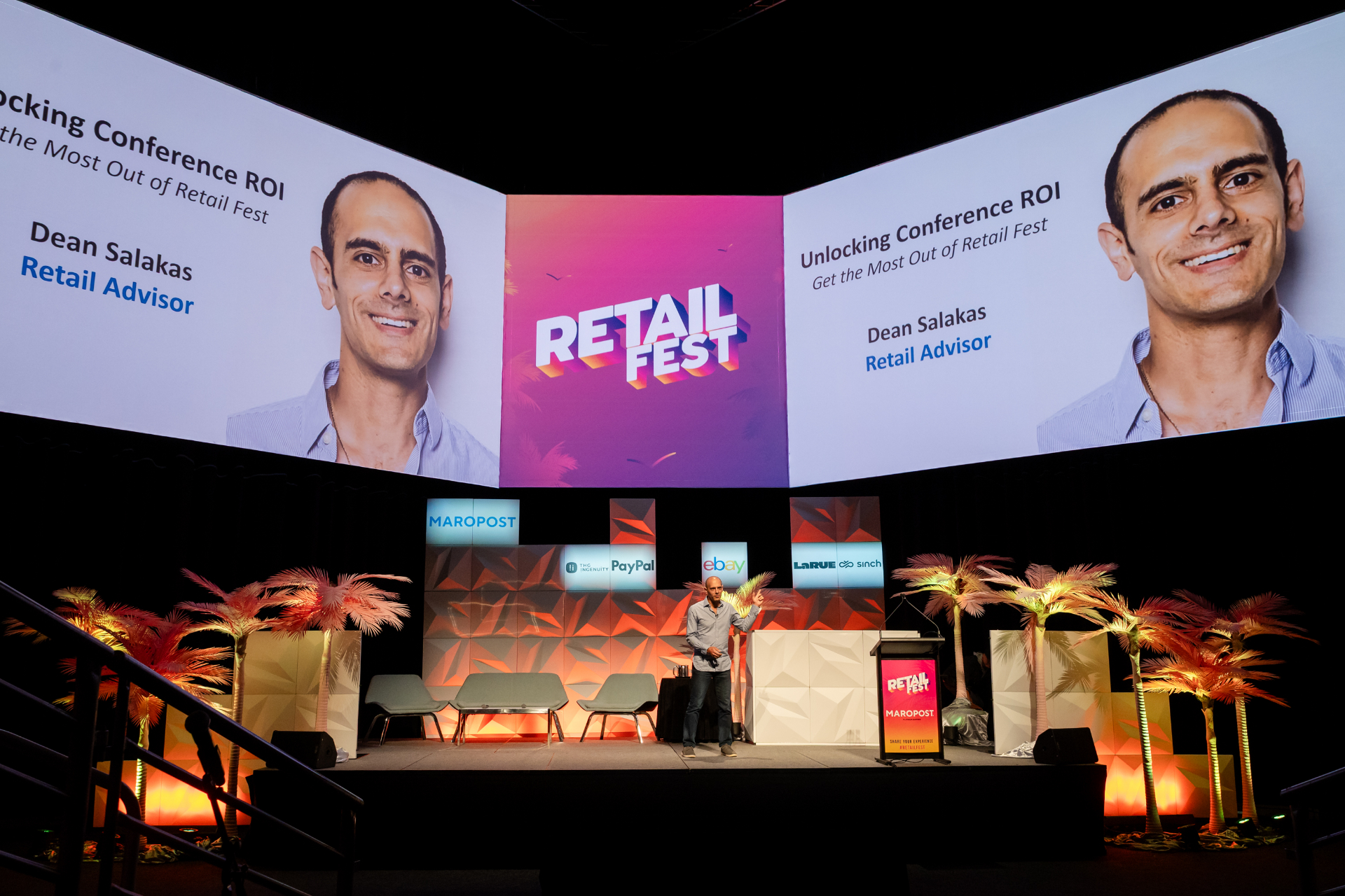 Dean Salakas presenting keynote on retail strategies at industry conference